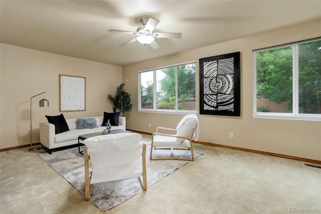 14910 Williams St, Thornton, CO 80602 - living area with carpet floors, a ceiling fan, and baseboards