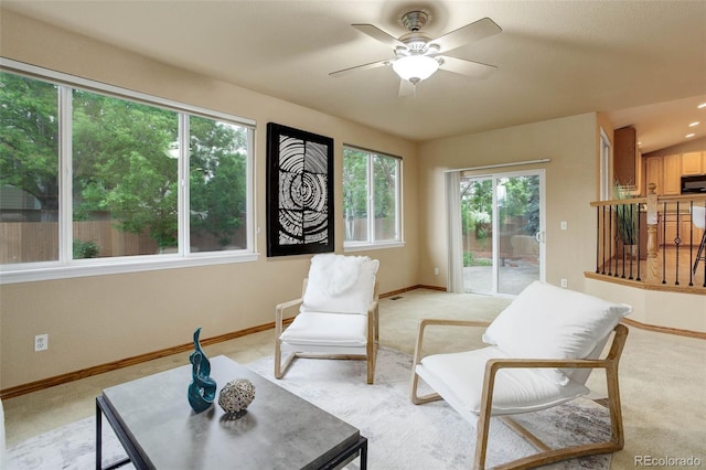 14910 Williams St, Thornton, CO 80602 - living area with baseboards, light carpet, and a ceiling fan