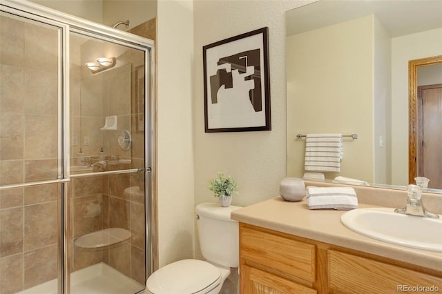 14910 Williams St, Thornton, CO 80602 - bathroom featuring toilet, vanity, and a shower stall