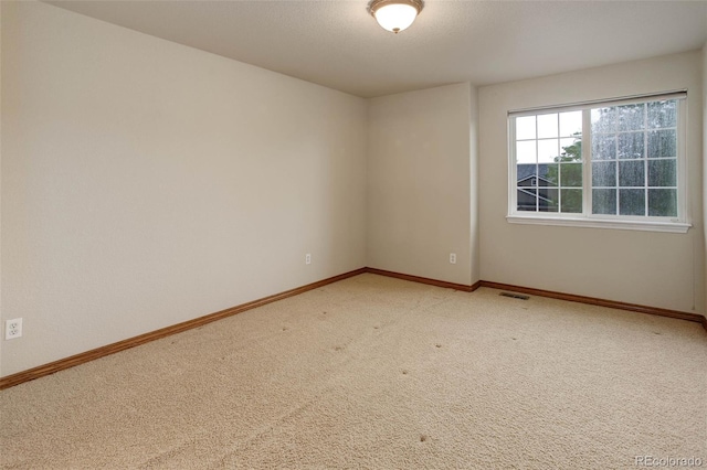 14910 Williams St, Thornton, CO 80602 - empty room with light colored carpet and baseboards