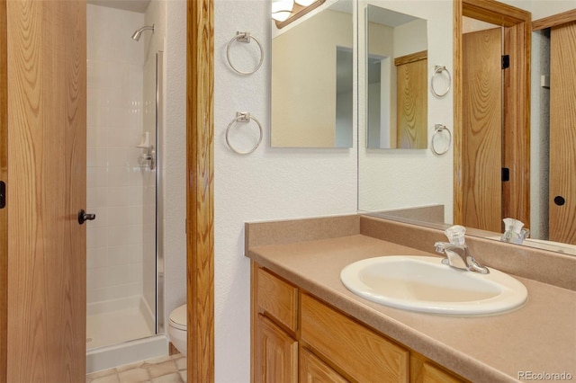 14910 Williams St, Thornton, CO 80602 - full bath featuring a shower stall, vanity, and toilet