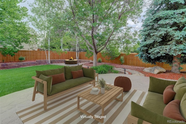 14910 Williams St, Thornton, CO 80602 - view of patio / terrace featuring an outdoor living space with a fire pit