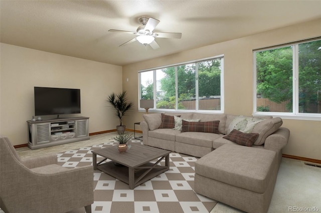 14910 Williams St, Thornton, CO 80602 - living area with a ceiling fan and baseboards