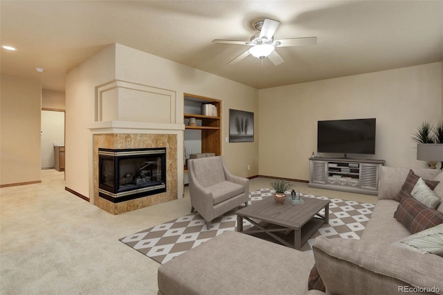 14910 Williams St, Thornton, CO 80602 - carpeted living area with ceiling fan and a tiled fireplace