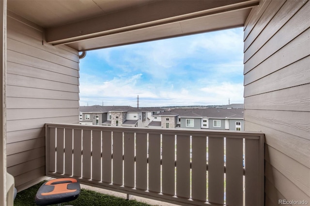 balcony featuring a residential view