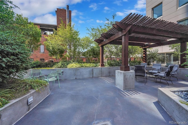 view of patio featuring a pergola