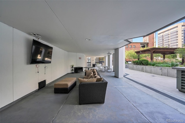 view of patio with a pergola and an outdoor living space