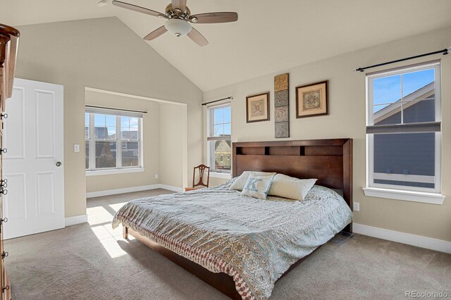 bedroom with carpet floors, high vaulted ceiling, a ceiling fan, and baseboards