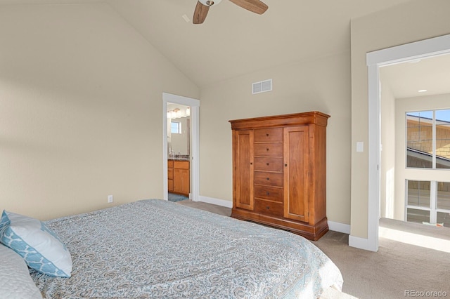 carpeted bedroom featuring baseboards, visible vents, connected bathroom, a ceiling fan, and high vaulted ceiling