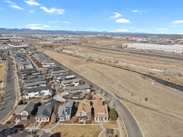 drone / aerial view with a residential view and a mountain view