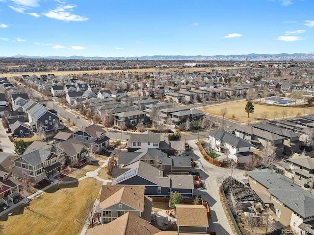 bird's eye view featuring a mountain view and a residential view