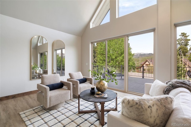 189 Pine Cone Ln, Winter Park, CO 80482 - living area with high vaulted ceiling and light wood finished floors