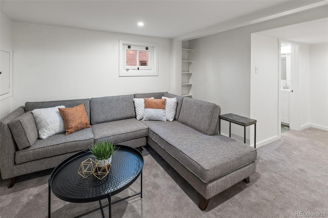 living room with light colored carpet