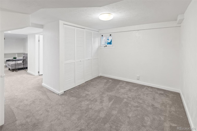 interior space featuring a textured ceiling