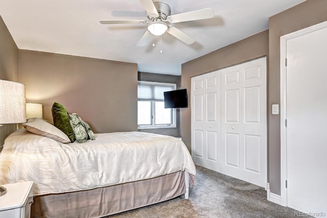 7877 S University Way, Centennial, CO 80122 - carpeted bedroom with a closet and ceiling fan