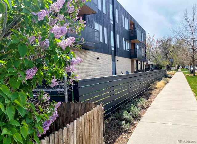 2718 Pine St Unit 305, Boulder, CO 80302 - view of side of home featuring brick siding