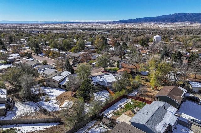 7003 Cleveland Ct, Colorado Springs, CO 80911 - aerial perspective of suburban area featuring a mountain backdrop