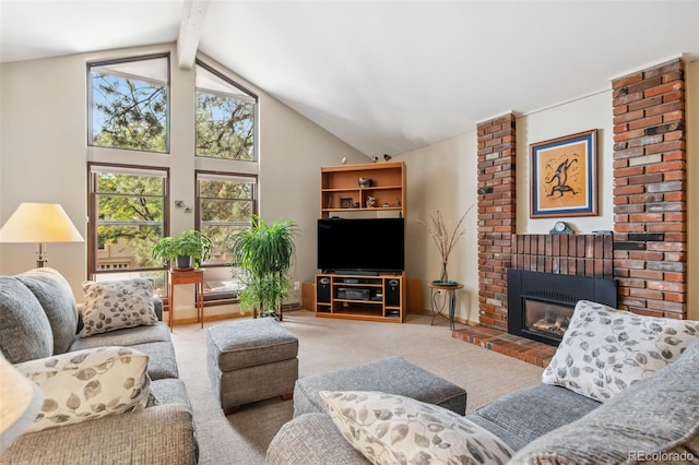 carpeted living room featuring lofted ceiling with beams and a brick fireplace