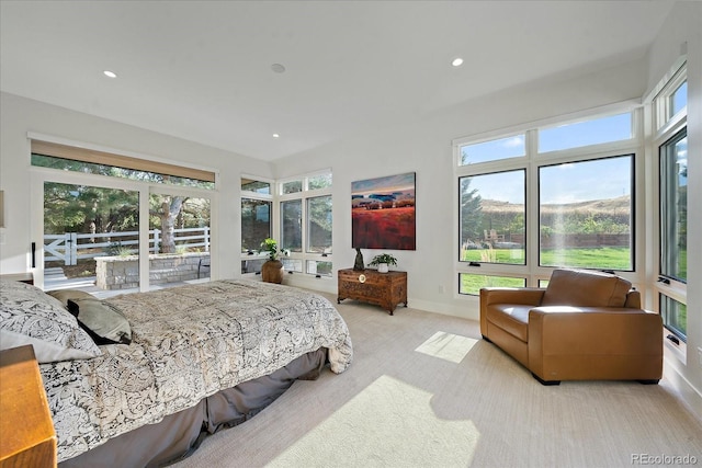 bedroom featuring light colored carpet