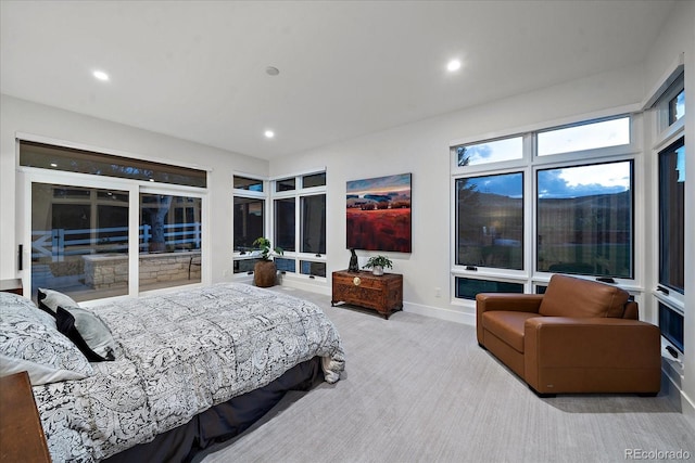 bedroom with light colored carpet