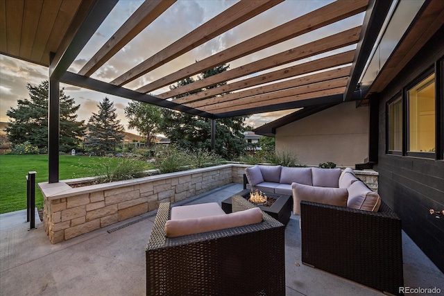 patio terrace at dusk with an outdoor living space with a fire pit, a pergola, and a lawn