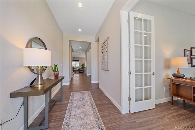 hallway with dark wood-type flooring