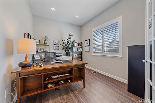 office space featuring hardwood / wood-style flooring