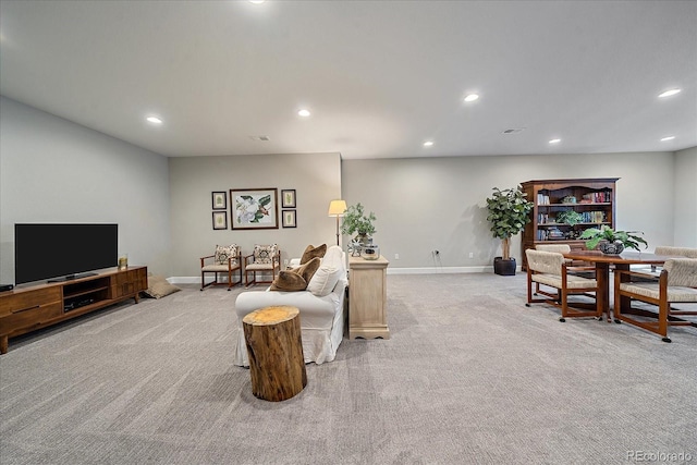 living room featuring light colored carpet