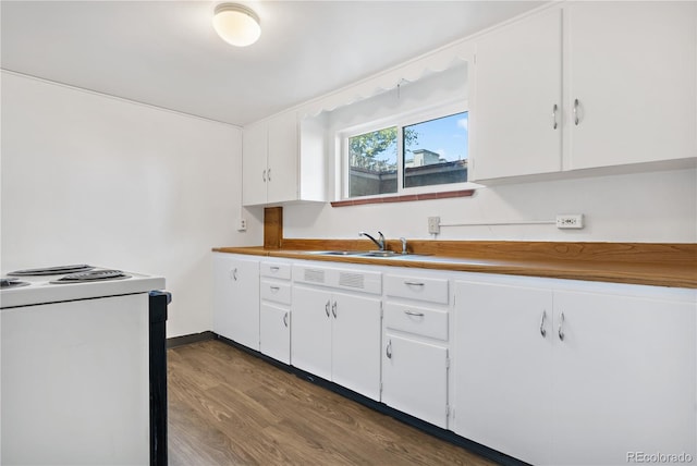 kitchen featuring white cabinets, white range with electric cooktop, and dark hardwood / wood-style flooring