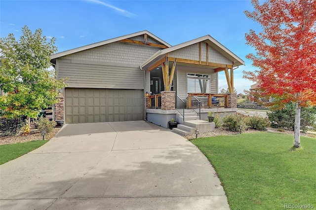 view of front facade featuring a porch, a front yard, and a garage