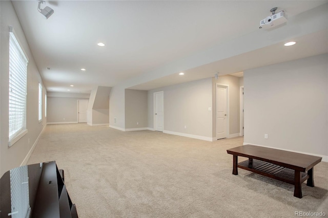 living room featuring light carpet