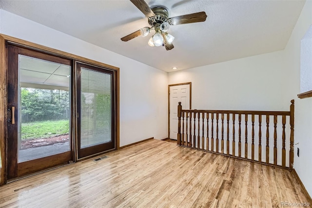 16293 E Brown Pl, Aurora, CO 80013 - unfurnished room with light wood-style floors and a ceiling fan