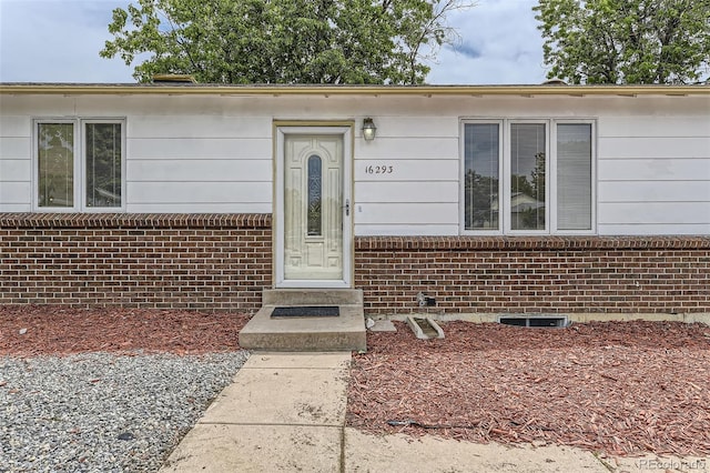 16293 E Brown Pl, Aurora, CO 80013 - view of exterior entry with brick siding