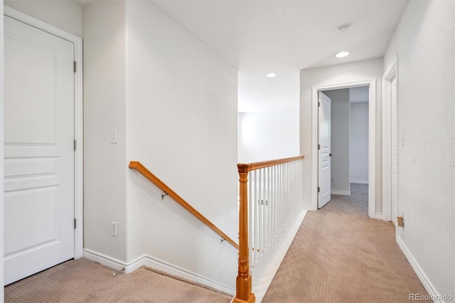 11969 E Lake Cir, Greenwood Village, CO 80111 - corridor featuring an upstairs landing, light carpet, recessed lighting, and baseboards
