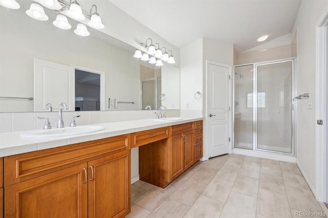 11969 E Lake Cir, Greenwood Village, CO 80111 - bathroom with double vanity, a shower stall, tile patterned flooring, and vaulted ceiling