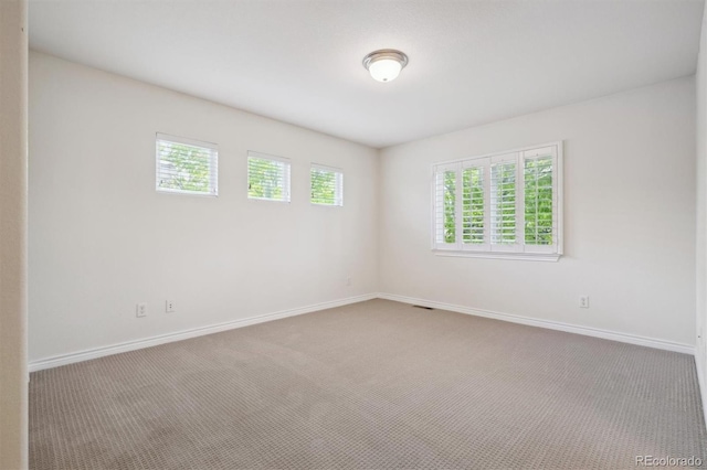 11969 E Lake Cir, Greenwood Village, CO 80111 - empty room with baseboards and carpet floors