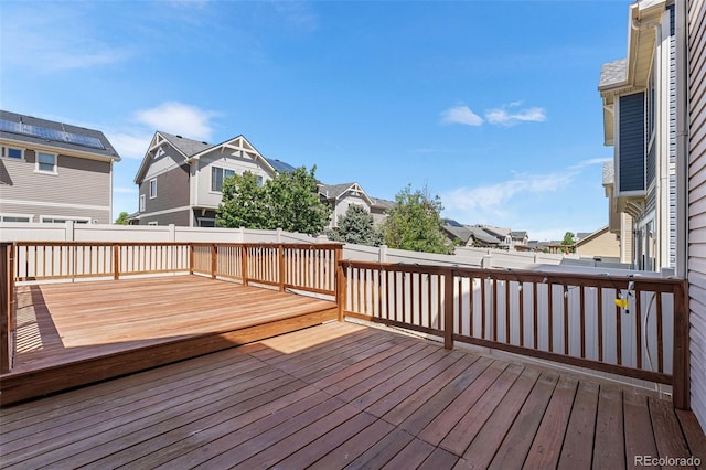 4405 Walden Ct, Denver, CO 80249 - wooden deck with a residential view and a fenced backyard