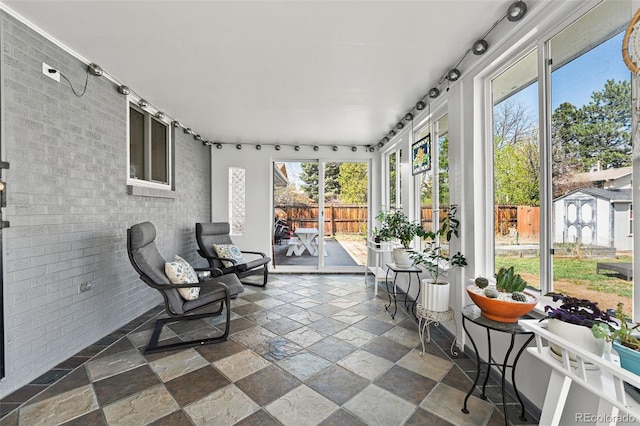 sunroom with rail lighting
