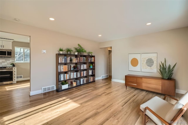 living area featuring light hardwood / wood-style flooring