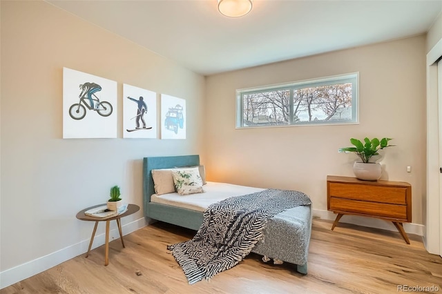 bedroom featuring wood-type flooring