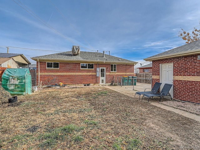 rear view of property featuring a patio