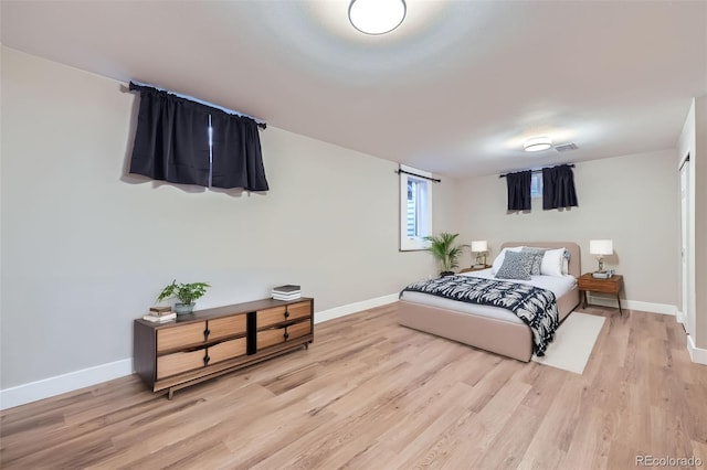 bedroom featuring light hardwood / wood-style floors