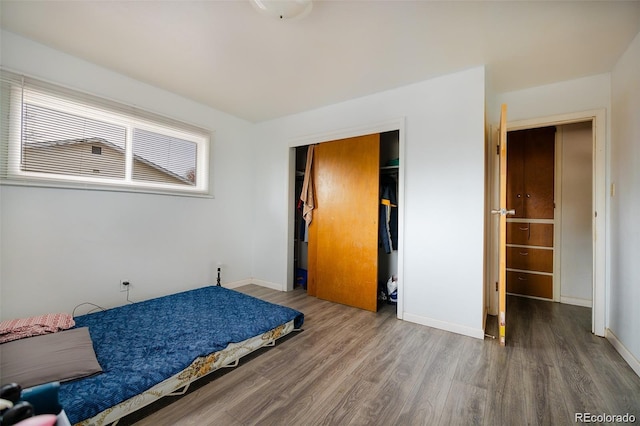 612 W Bijou Ave, Fort Morgan, CO 80701 - bedroom with wood finished floors and a closet