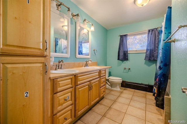 612 W Bijou Ave, Fort Morgan, CO 80701 - bathroom with double vanity, tile patterned flooring, and a shower with shower curtain