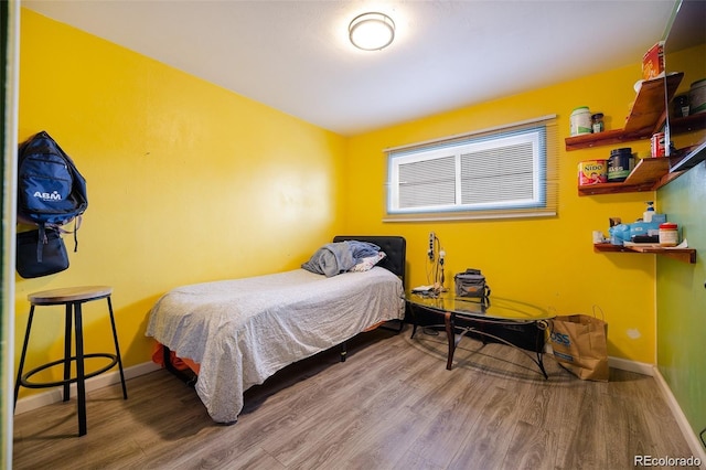 612 W Bijou Ave, Fort Morgan, CO 80701 - bedroom featuring wood finished floors