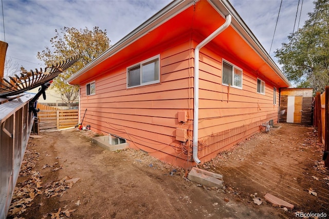 612 W Bijou Ave, Fort Morgan, CO 80701 - view of side of property featuring a fenced backyard