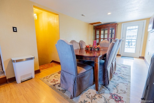 3021 Grape St, Denver, CO 80207 - dining space with light wood-type flooring and baseboards