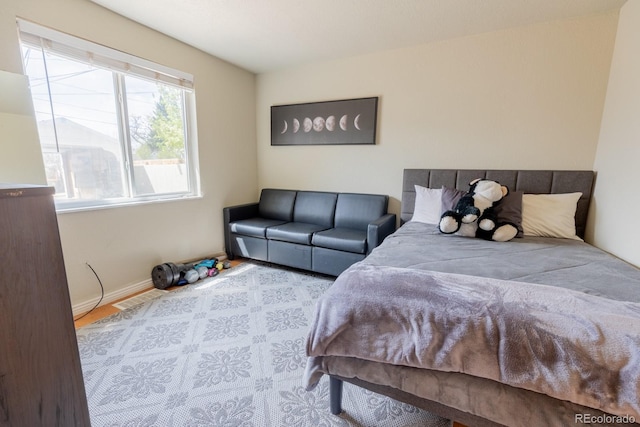 3021 Grape St, Denver, CO 80207 - bedroom with baseboards and wood finished floors