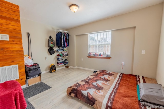 3021 Grape St, Denver, CO 80207 - bedroom with wood finished floors and baseboards