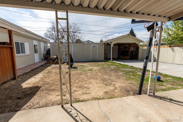 3021 Grape St, Denver, CO 80207 - view of yard featuring fence, a patio, an outbuilding, and a shed